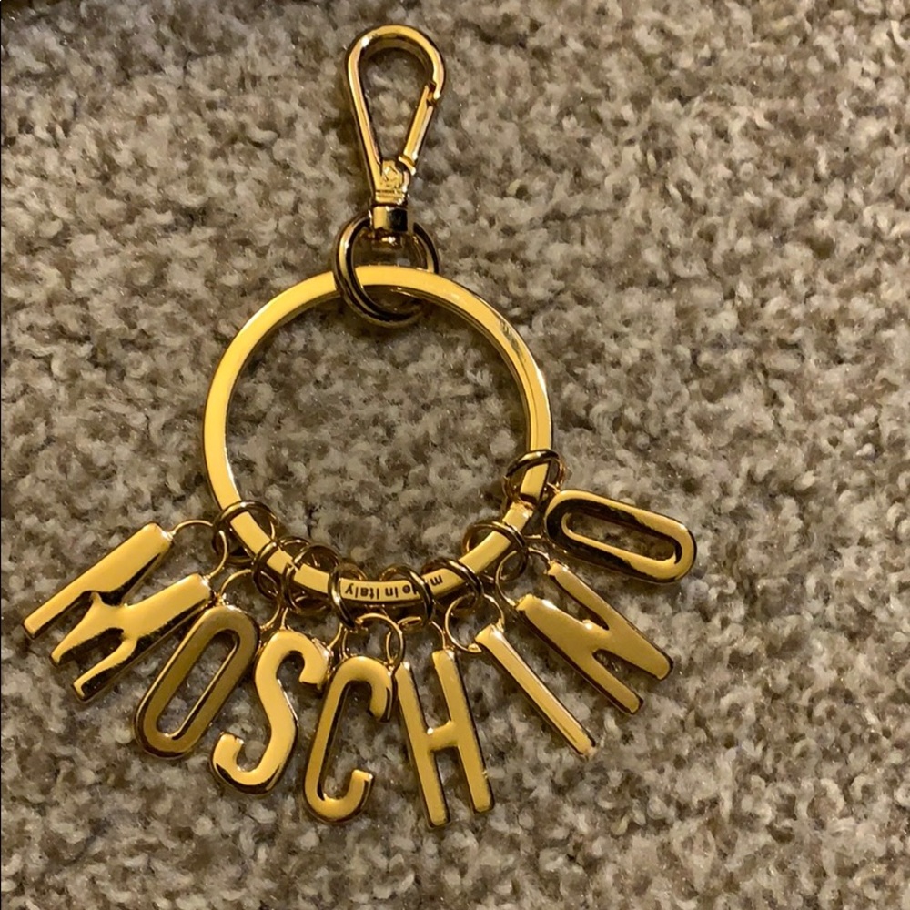 Moschino gold keychain